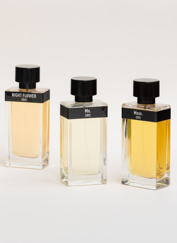 Three perfume bottles from the brand Eris Parfums range set against a white background. Starting on the left with Night Flower, Mx. and then Mxxx.