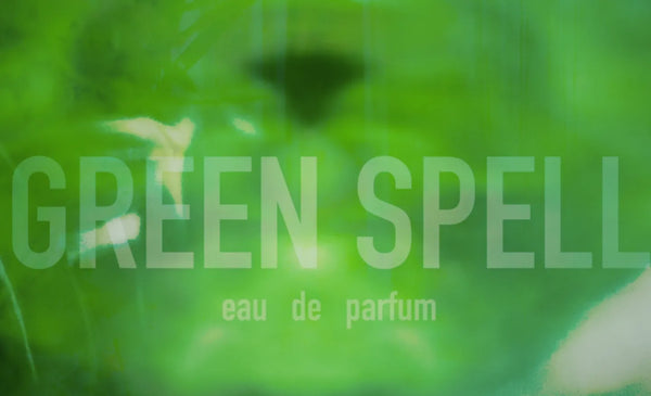 The words "Green Spell eau de parfum" on a vivid green abstract background for ERIS Parfums new green perfume